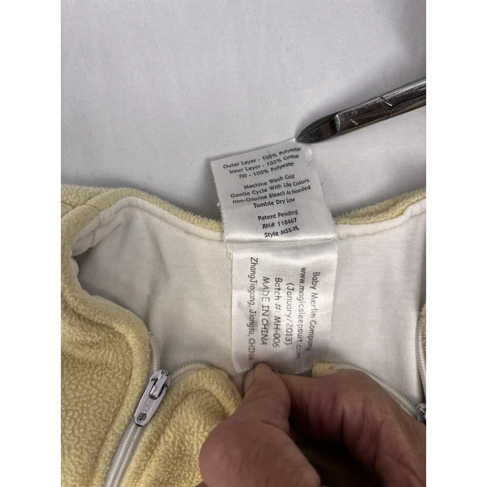 Baby Merlin’S Magic Sleepsuit soft yellow